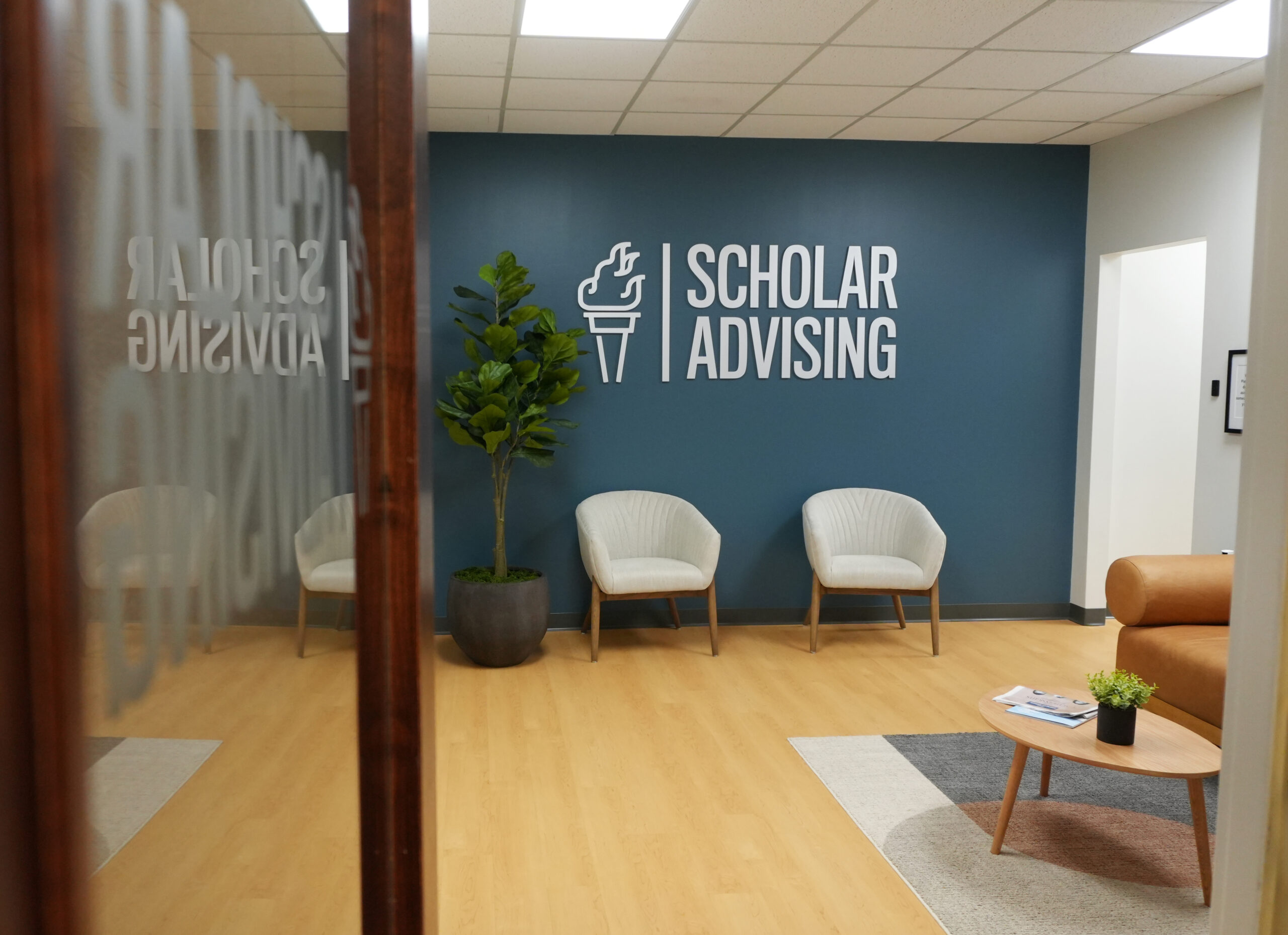 Scholar Advising office lobby with couch and chairs